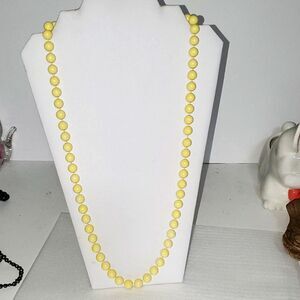A Buttery Yellow Vintage Plastic Bead Necklace Classic Mid Century Jewelry